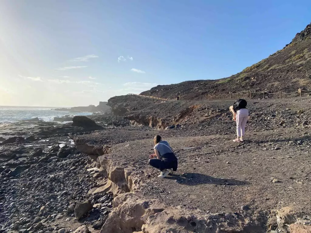Collecting Sea Glass in a beach in Gran Canaria