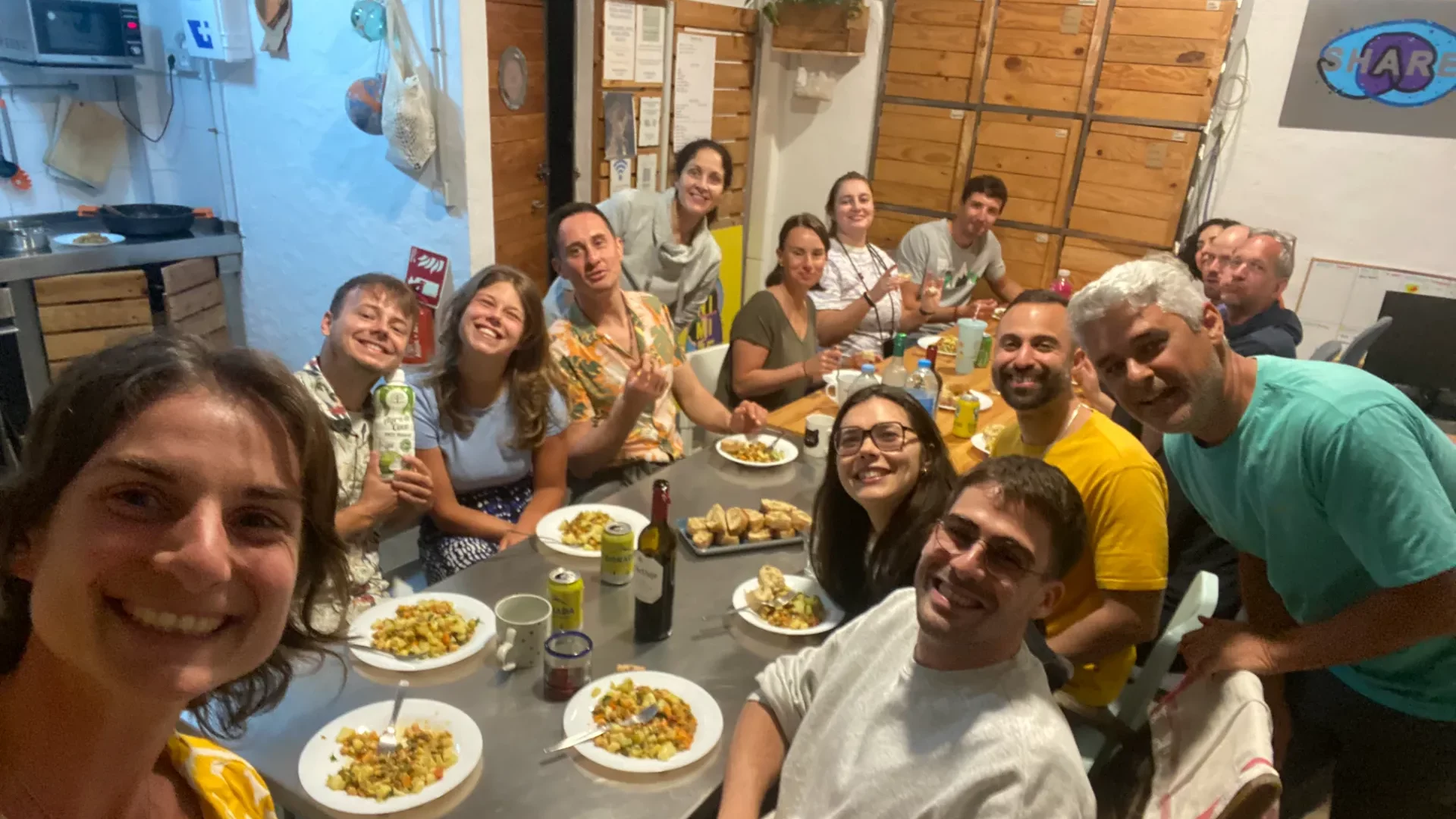 Community dinner in Coliving in Gran Canaria, group of people having dinner